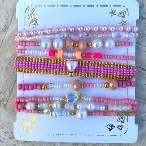 Handmade Colombian beaded pink bracelets.